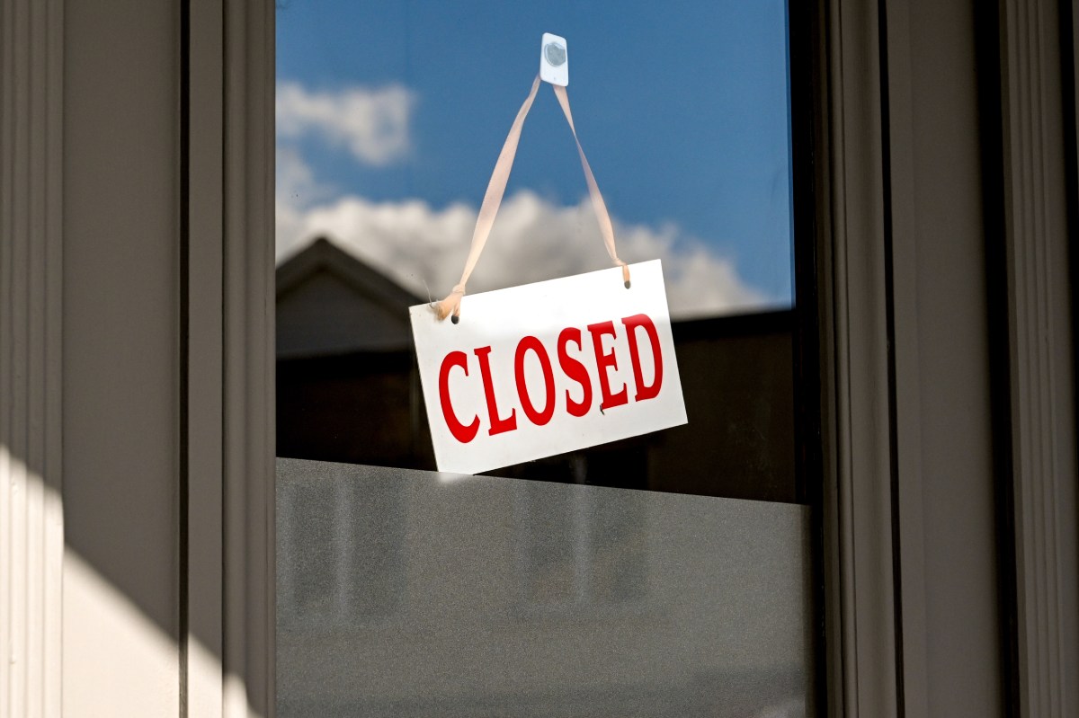 A closed sign displayed on a door